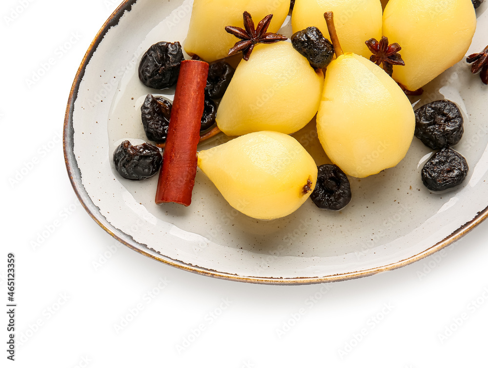 Delicious poached pears and prunes in plate on white background, closeup