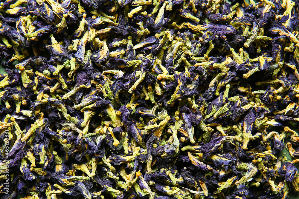 Texture of dried butterfly pea flower tea as background