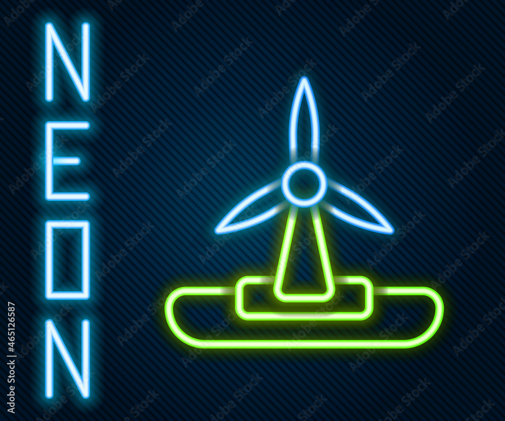 Glowing neon line Wind turbine icon isolated on black background. Wind generator sign. Windmill for 