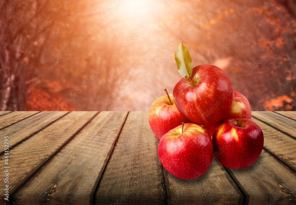 Fresh ripe apples on the wooden desk