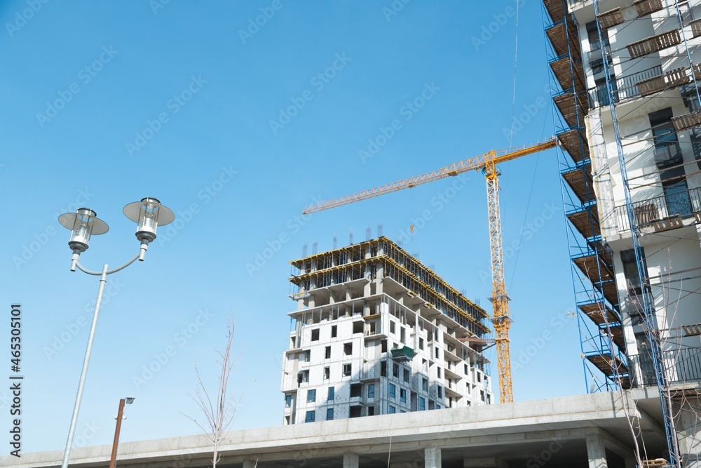 The architectural complex of residential buildings on sky background