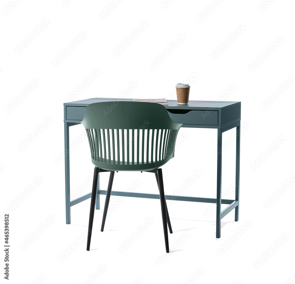 Modern table with paper cup of coffee, magazine and chair on white background