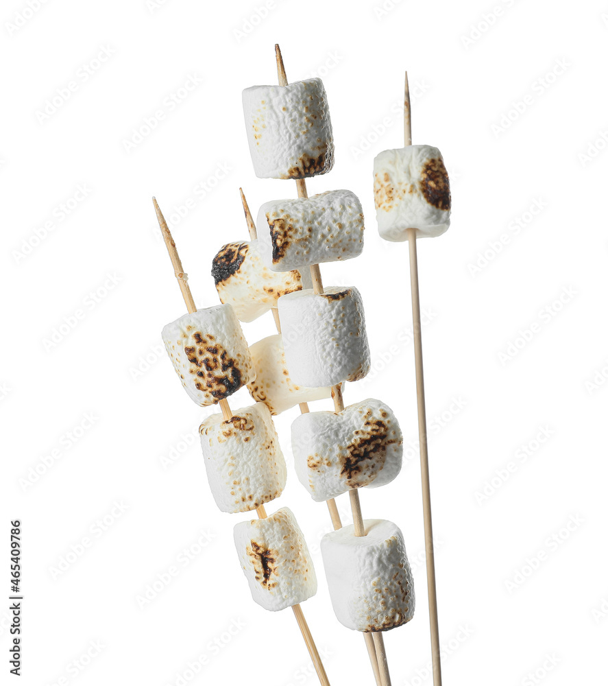 Skewers with sweet grilled marshmallow on white background, closeup