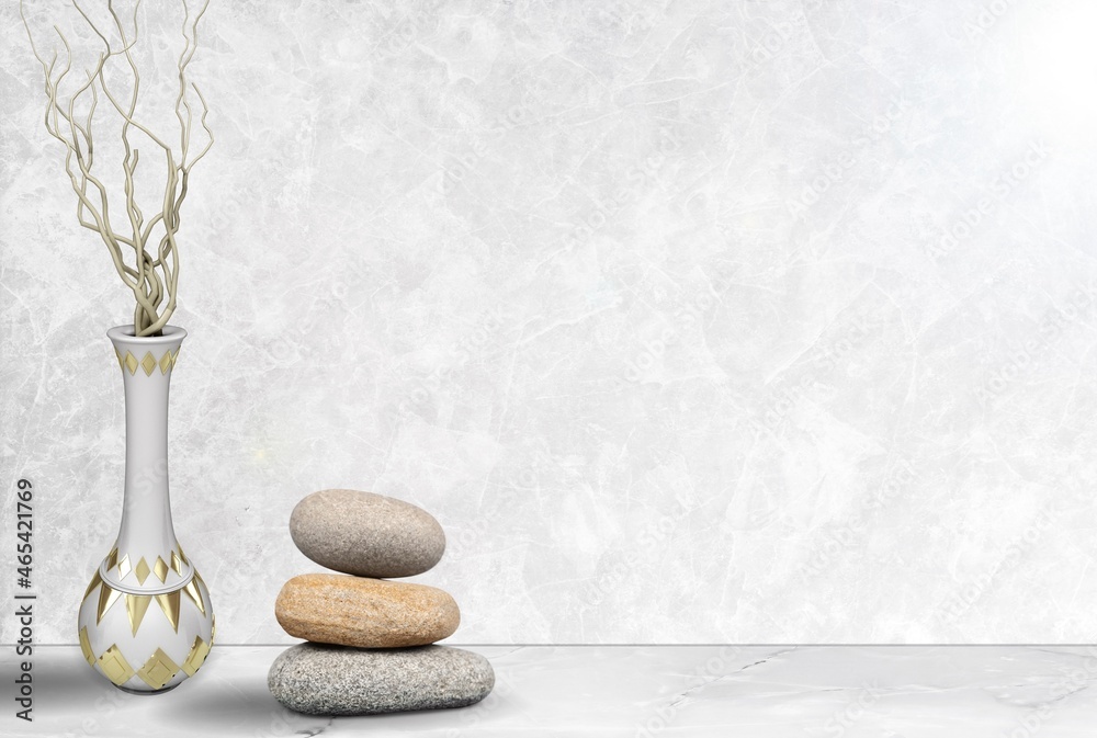 Grey natural stones podium on background, platform for product display and dry branches