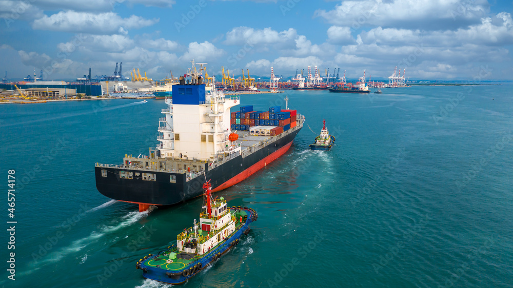 Container ship carrying container box in import export to commercial port, Global business cargo fre