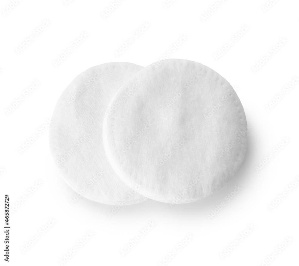 Round cotton pads on white background