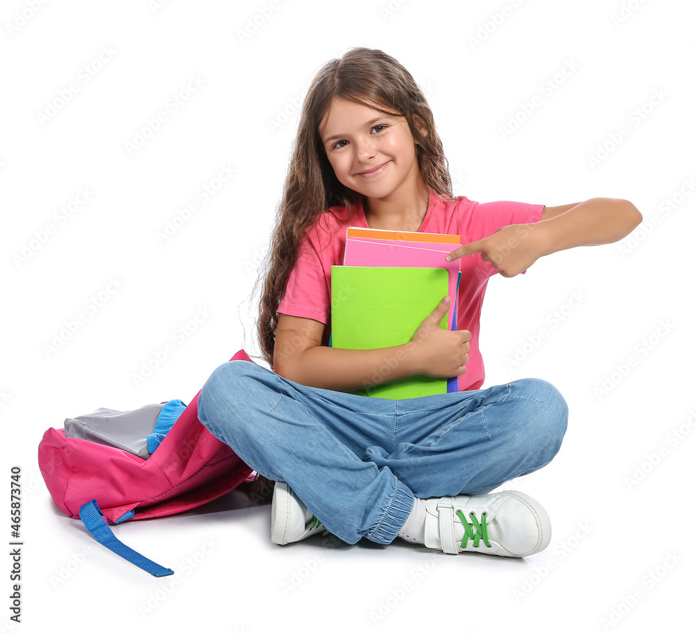 Little schoolgirl isolated on white