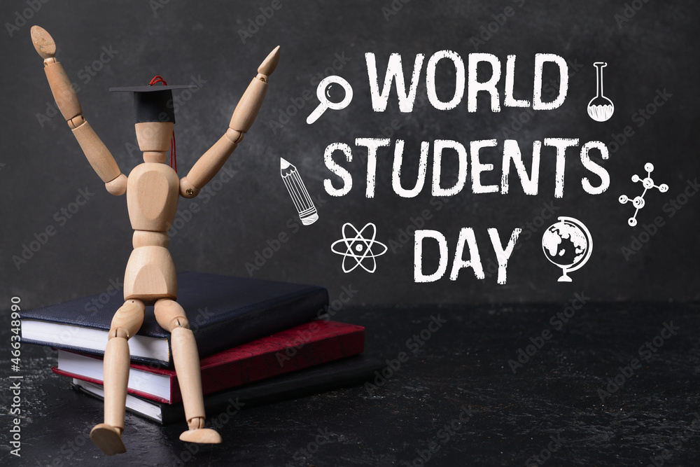 Greeting card for World Students Day with mannequin and books