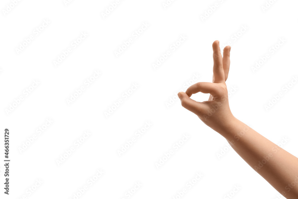 Child performing a shadow play on white background