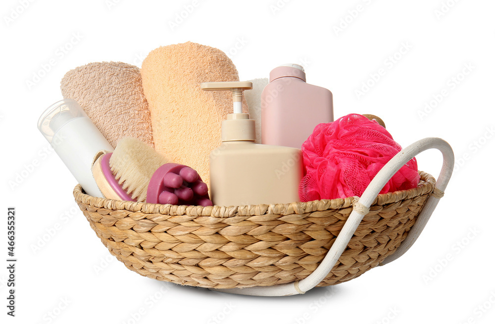 Wicker basket with bath supplies isolated on white background