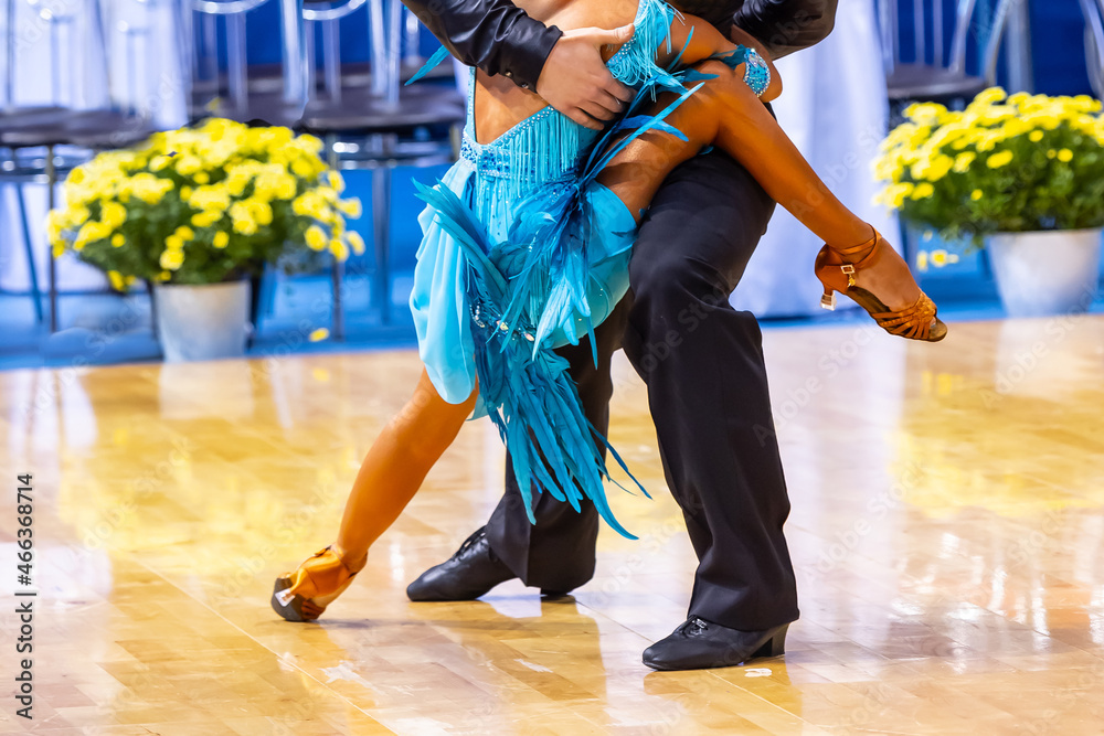 Woman and man dancing latin program. International competition.