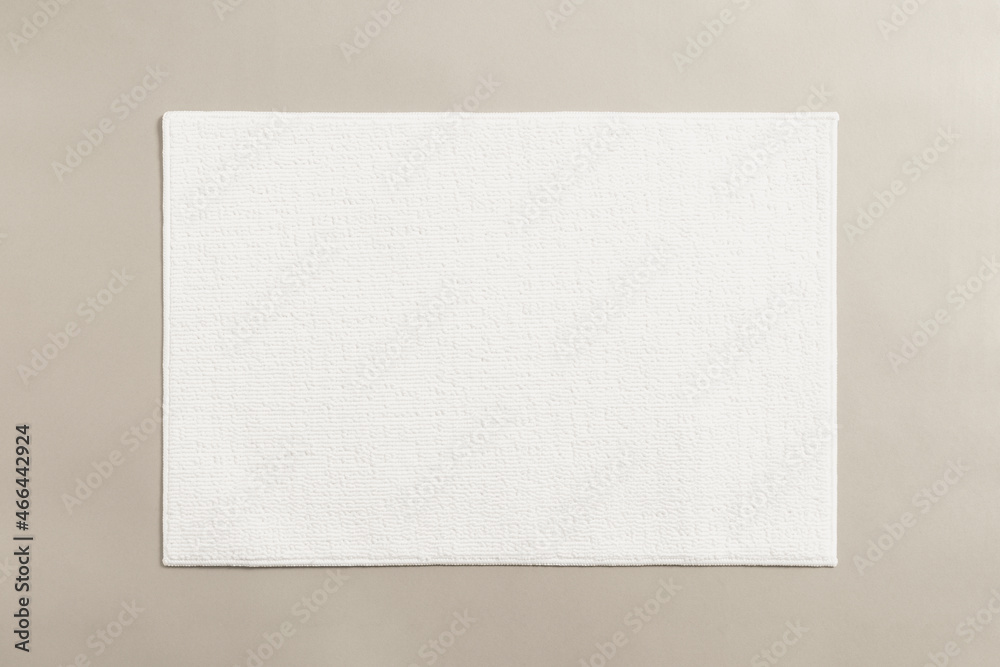 White cotton bathroom mat on the floor