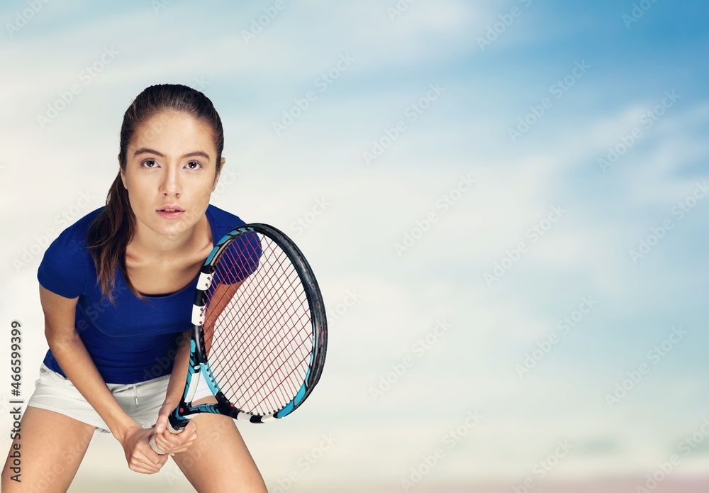 Tennis player. Beautiful girl and athlete with racket in sportswear