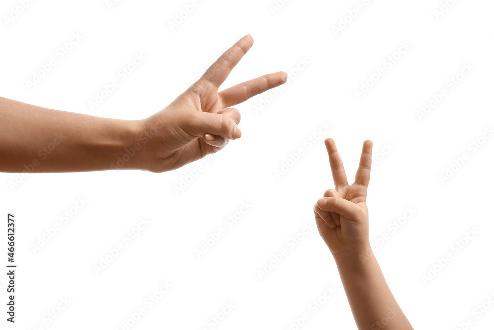 Mother and child performing a shadow play on white background