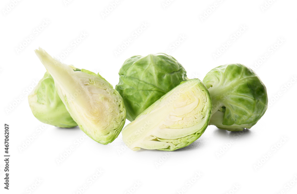 Ripe fresh Brussels sprouts on white background