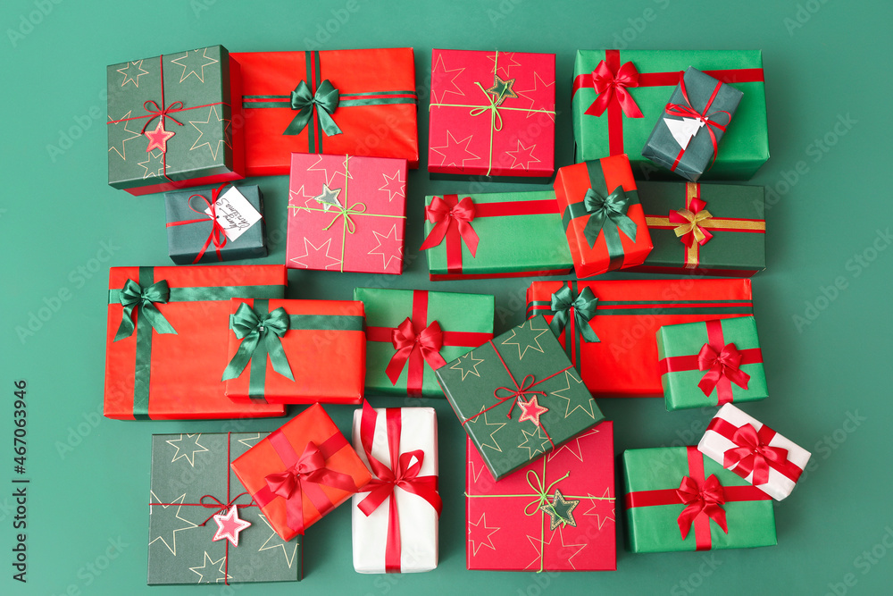 Different Christmas presents on color background