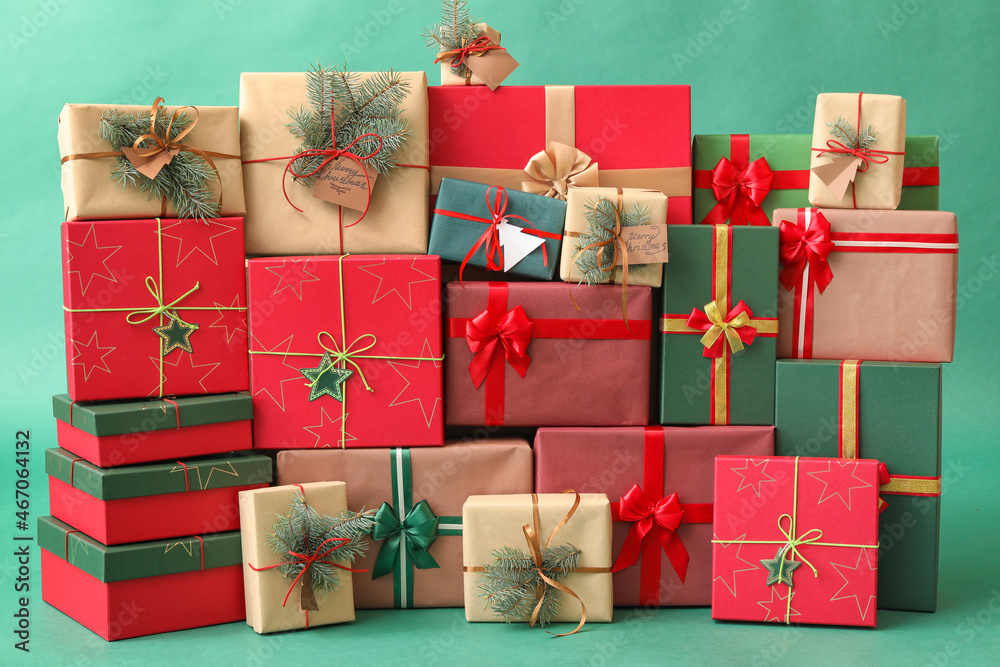 Different Christmas presents on color background