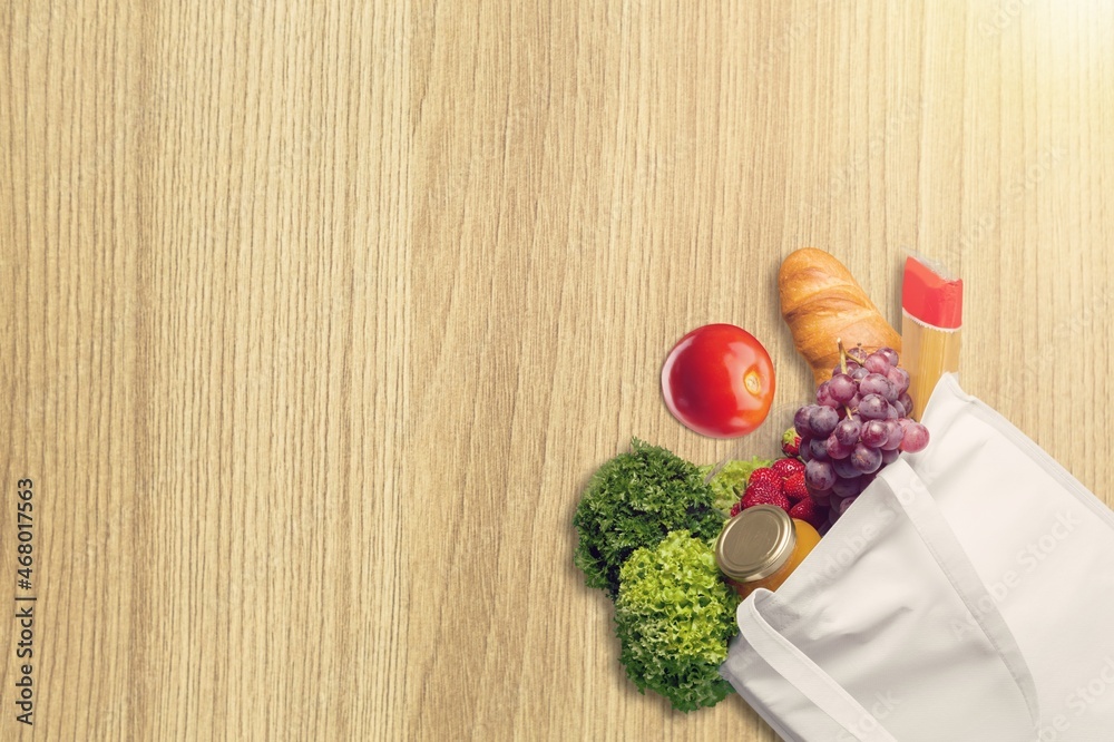 Set of fresh vegetables in grocery paper bag