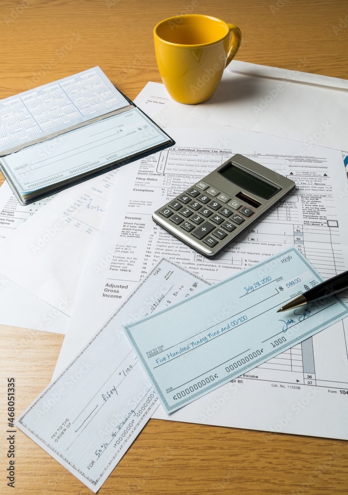 Tax Forms with Calculator,Checkbook and Cup