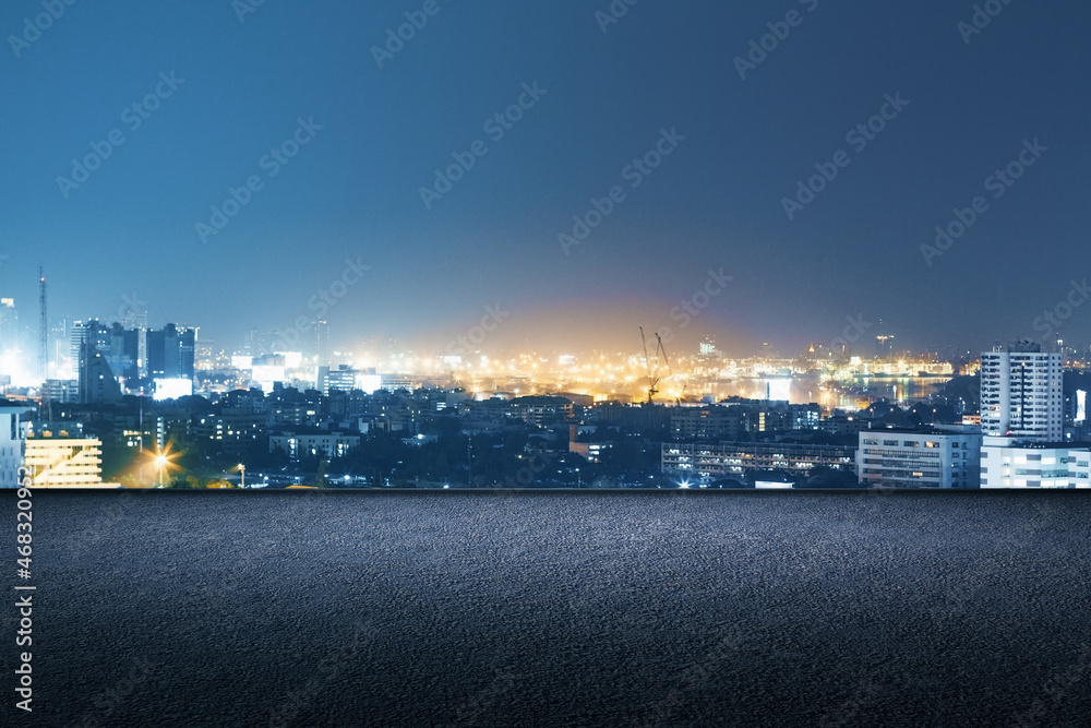 Concrete rooftop with night city view and mock up place for your advertisement. Beautiful texture. D