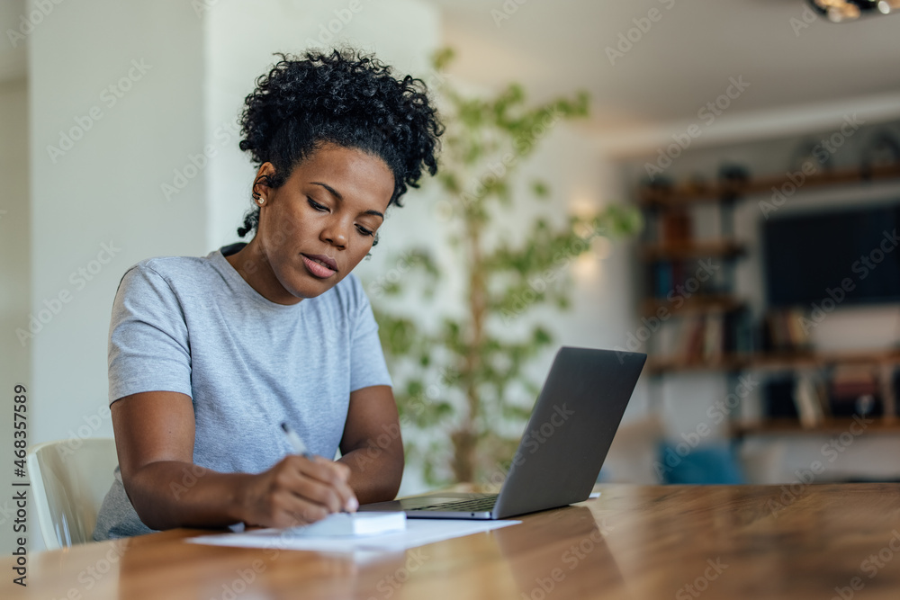 Concentrated adult woman, taking her job seriously