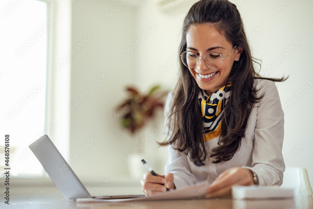 Busy caucasian woman, getting ready to hold interviews