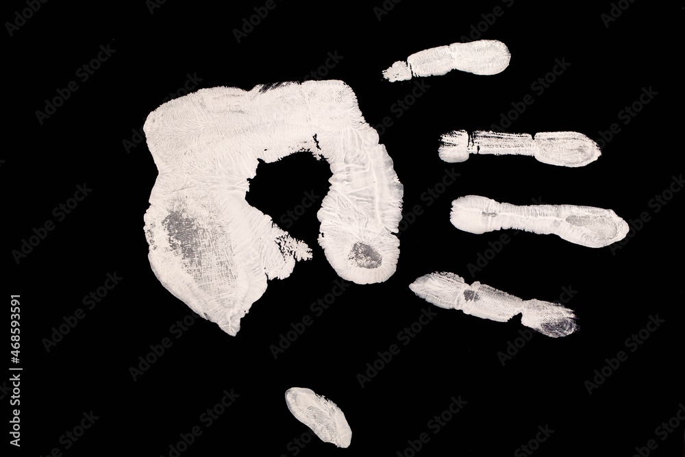 White Handprint on Black Background