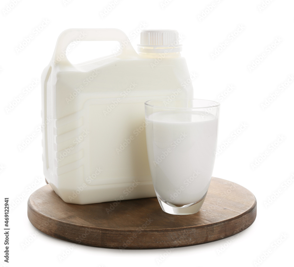 Gallon bottle and glass of milk on white background