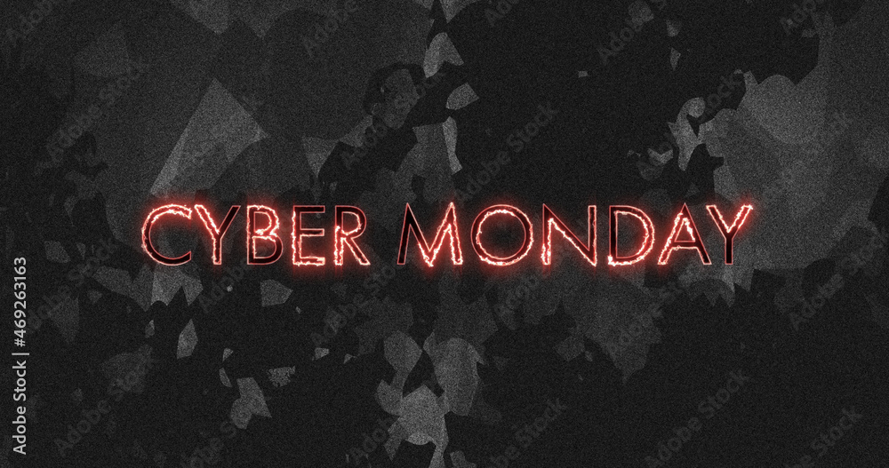 Image of cyber monday text on fire over distressed black background