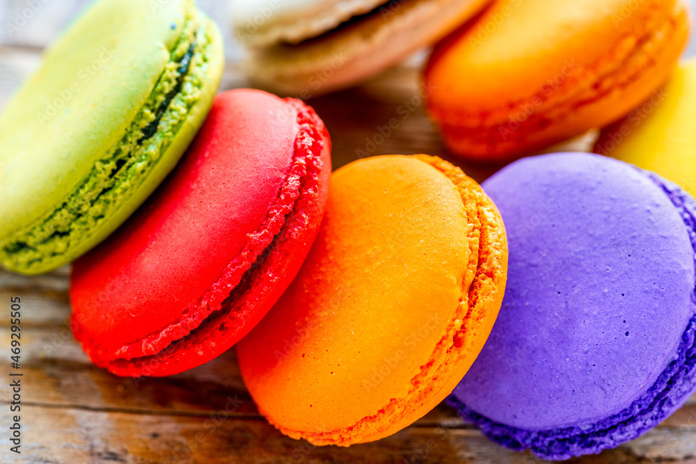 multicolored macaroon cookies on a wooden table