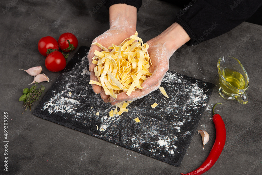 Italian pasta cooking process. Fresh food concept. Home made tagliatelle