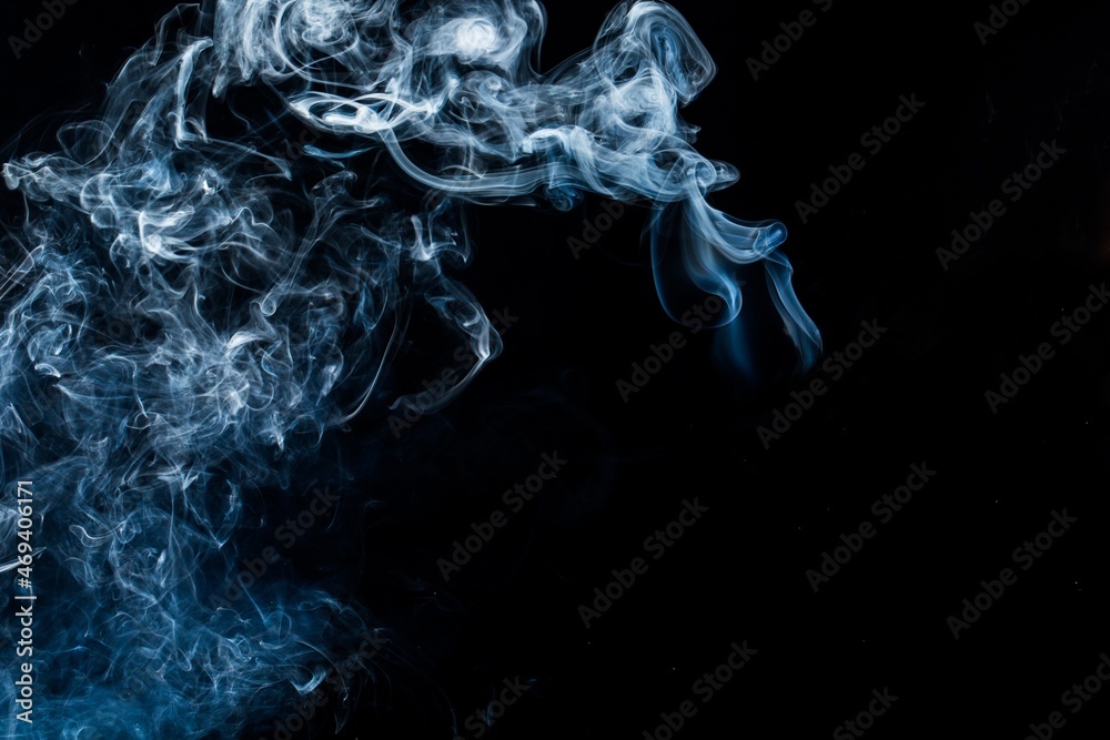 Smoke fragments on a black background