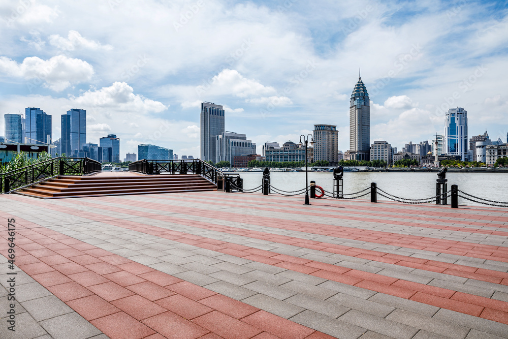 Panoramic skyline and modern commercial buildings with empty road.empty square floors and cityscape.