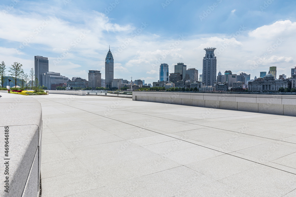 Panoramic skyline and modern commercial buildings with empty road.empty square floors and cityscape.