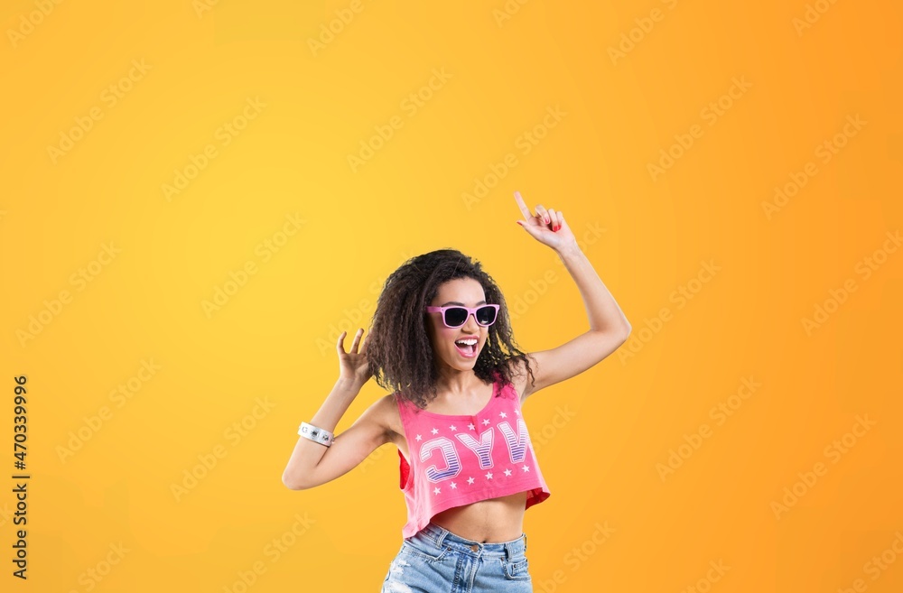 Young lady with positive expression, joyful and exciting, dressed in casual cloth