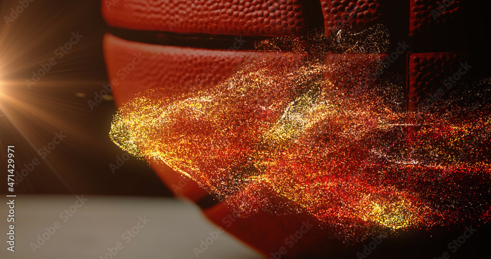 Image of glowing orange particles moving over basketball