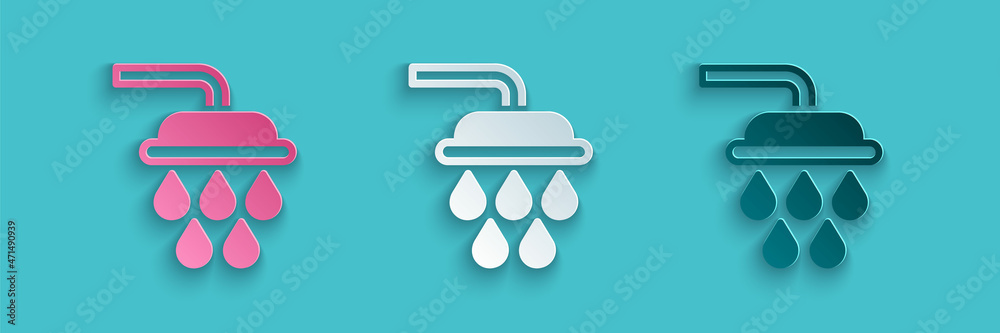 Paper cut Shower head with water drops flowing icon isolated on blue background. Paper art style. Ve