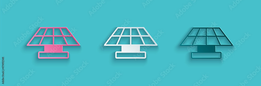 Paper cut Solar energy panel icon isolated on blue background. Paper art style. Vector