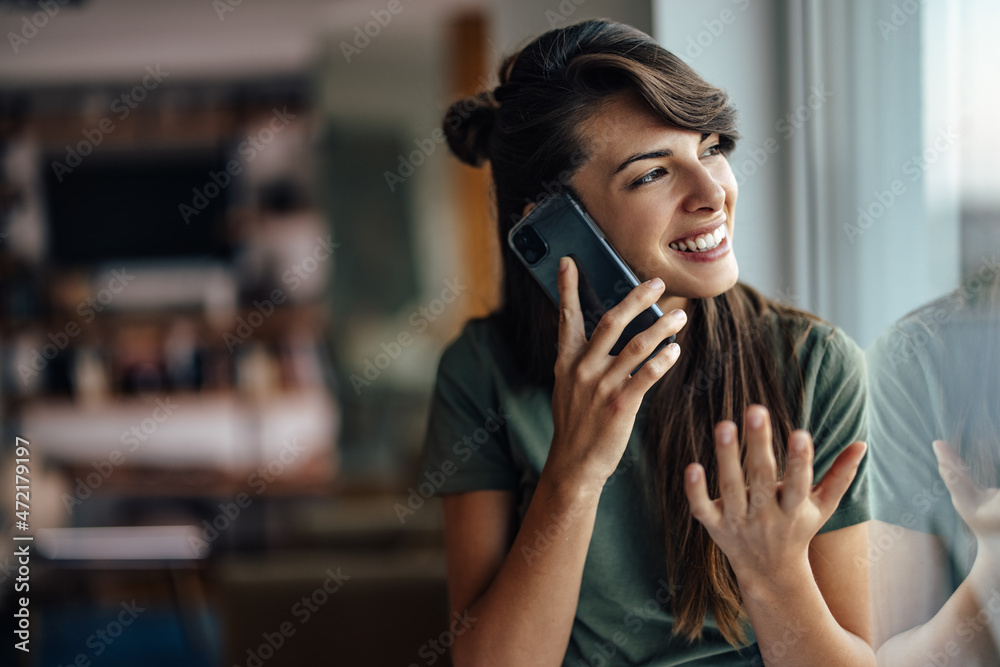 Interesting young woman, using her new phone