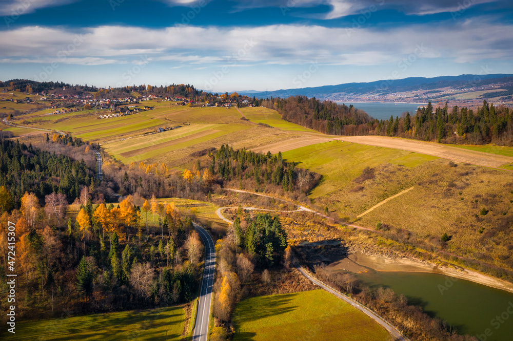 Beautiful landscape of Czorsztyn lake and Pieniny mountains in autumnal colors. Poland