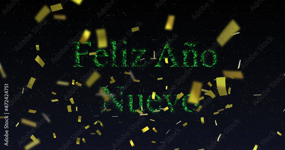 Image of feliz ano nuevo text in green with new year fireworks and gold confetti in night sky