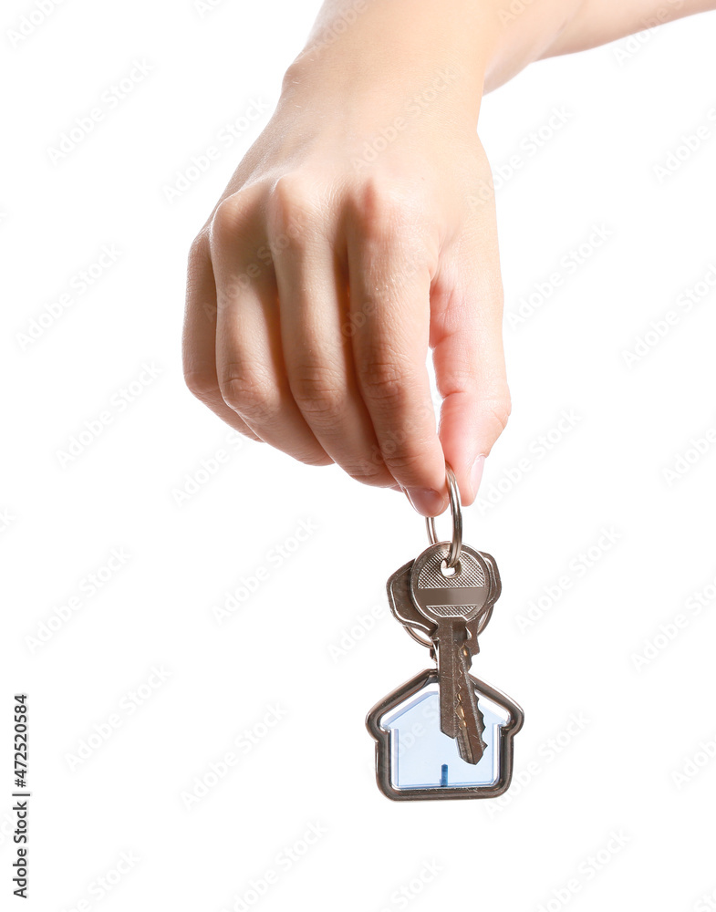 Woman with key from house on white background