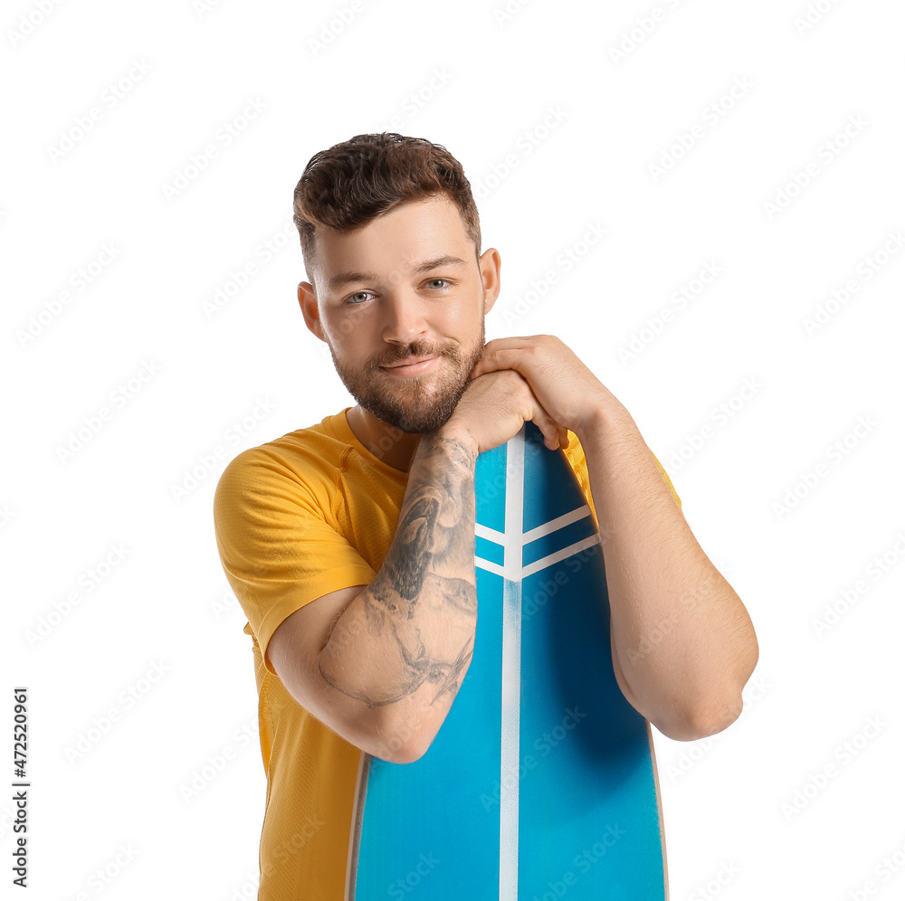 Handsome bearded man with surfboard on white background