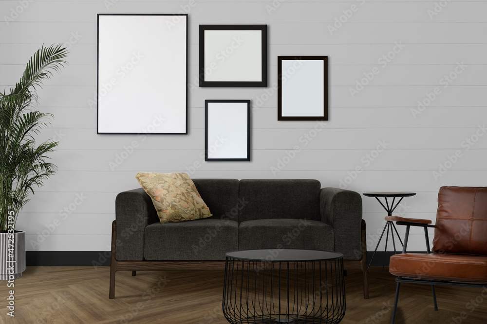 Blank gallery wall in a modern living room