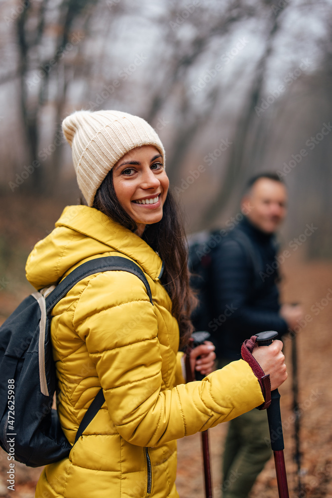 Portrait of happy, caucasian woman, enjoying the autumn weather.