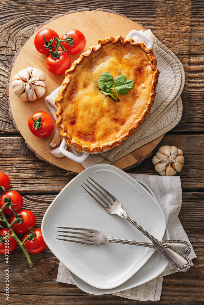 Tasty beef pot pie on table