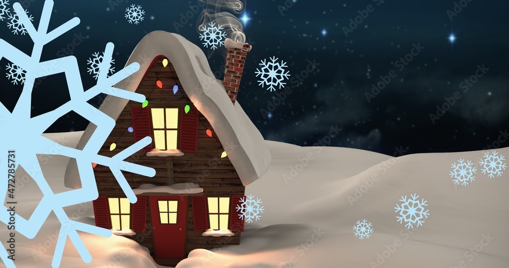 Composition of snowflakes with snow covered illuminated house at night