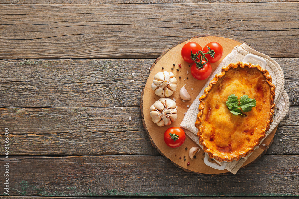 Tasty beef pot pie on table