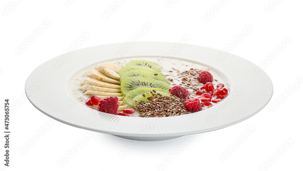 Tasty yoghurt with fruits and flax seeds in bowl on white background