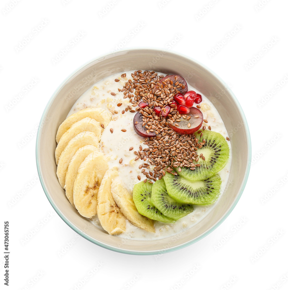 Tasty yoghurt with fruits and flax seeds in bowl on white background